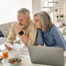 Illustration of retirement savings with tax planning concept, showing a calculator, tax forms, and retirement account documents