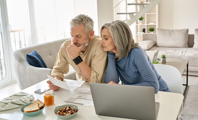 Illustration of retirement savings with tax planning concept, showing a calculator, tax forms, and retirement account documents